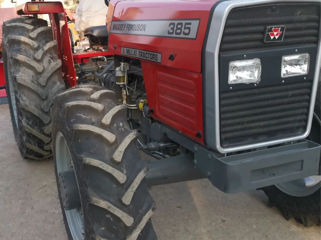Plan a farm tractor replacement in South Africa MF 385 4WD tractor showing treaded front tyres and grille